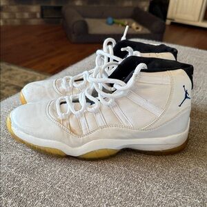 Jordan White and Black Athletic Shoes with Blue Logo